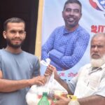 Distribution of food items among the flood victims of Assam